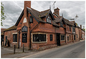 The Crown and Horns Public House, on the Corner of the High Street with Compton Road in East Ilsley